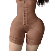 A pair of high-waisted white butt lifter shaping shorts with a decorative lace trim and front zipper closure, designed for tummy control and waistline enhancement.